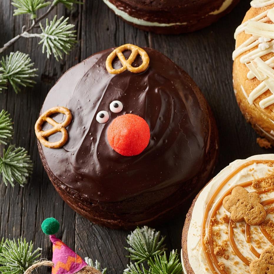 chocolate rudolph cake with marshmallow nose and pretzel ears 