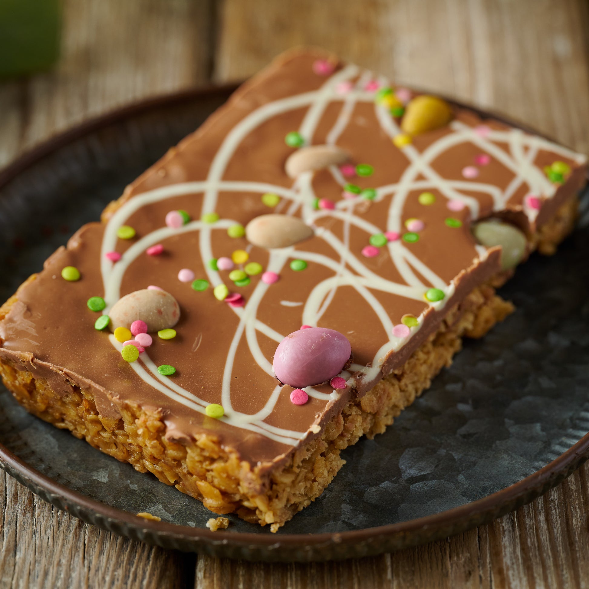 loaded flapjack topper with soft chocolate topping and mini eggs 