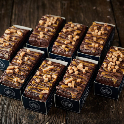 chocolate truffle cake topped with belgian chocolate, caramel and fudge pieces 